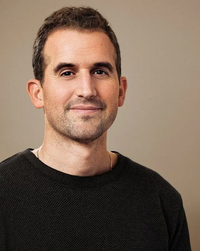 Portrait of Tom Brown, Co-Founder and Chief Compute Officer at Anthropic